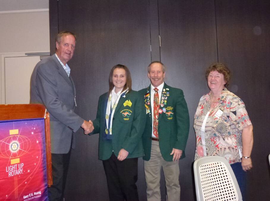 EXPERIENCE OF A LIFETIME: Rotary Club of Horsham president Phil Lohrey presents exchange student Kate Richardson with her blazer ahead of her exchange in December. Also pictured is Rotary District 9780 Youth Exchange Committee chairman Graeme Cox and assistant governor for youth services Sue Williams. Picture: CONTRIBUTED