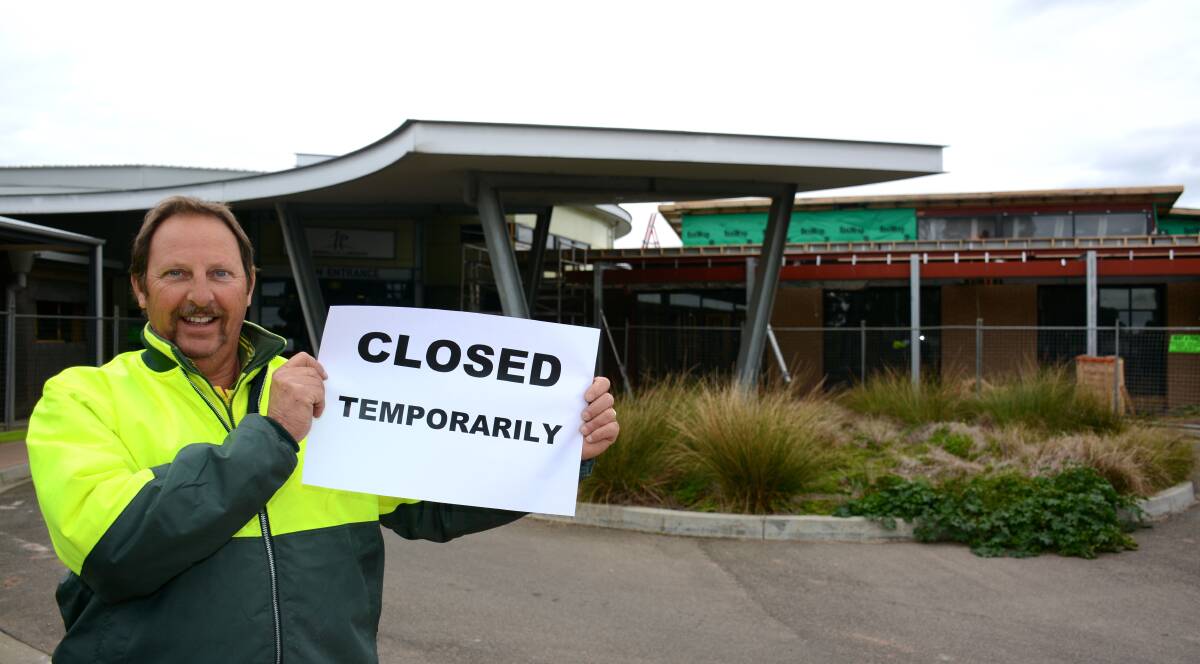 Rural Northwest Health occupational health and safety officer Rod Sinclair lets visitors know the service's Warracknabeal campus aged care entrance is closed. Picture: CONTRIBUTED