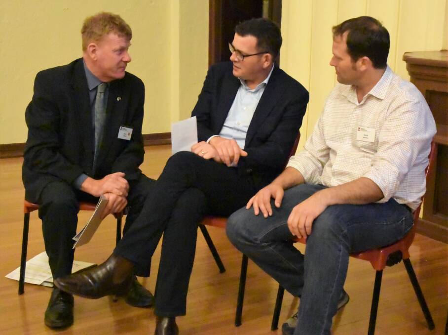 TIME TO LISTEN: Horsham councillor Mark Radford talks to Premier Daniel Andrews while Wimmera Southern Mallee Regional Partnership chair David Jochinke listens in. Picture: CARLY WERNER