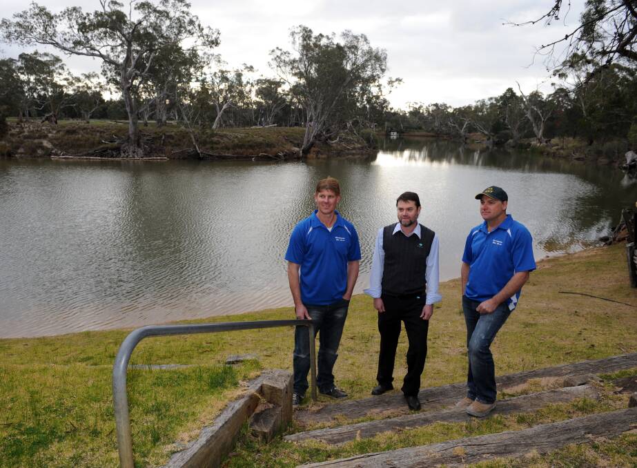 Dimboola Ski Club president Mark Gaulke, Wimmera Catchment Management Authority's Tony Baker and ski club member Tim Fechner discuss Wimmera CMA's environmental water forecast. Picture: PAUL CARRACHER