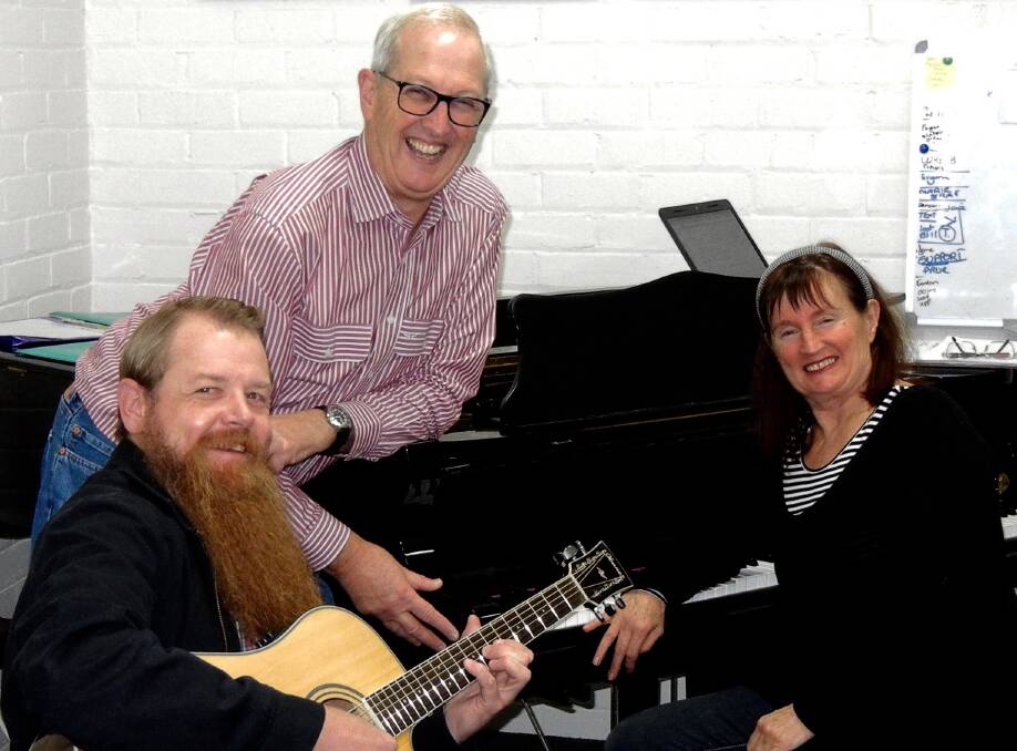 Voices of Wimmera guitarist Robbie Miller, founder and chairman Max Pietruschka and choir director Unmani. Picture: CONTRIBUTED