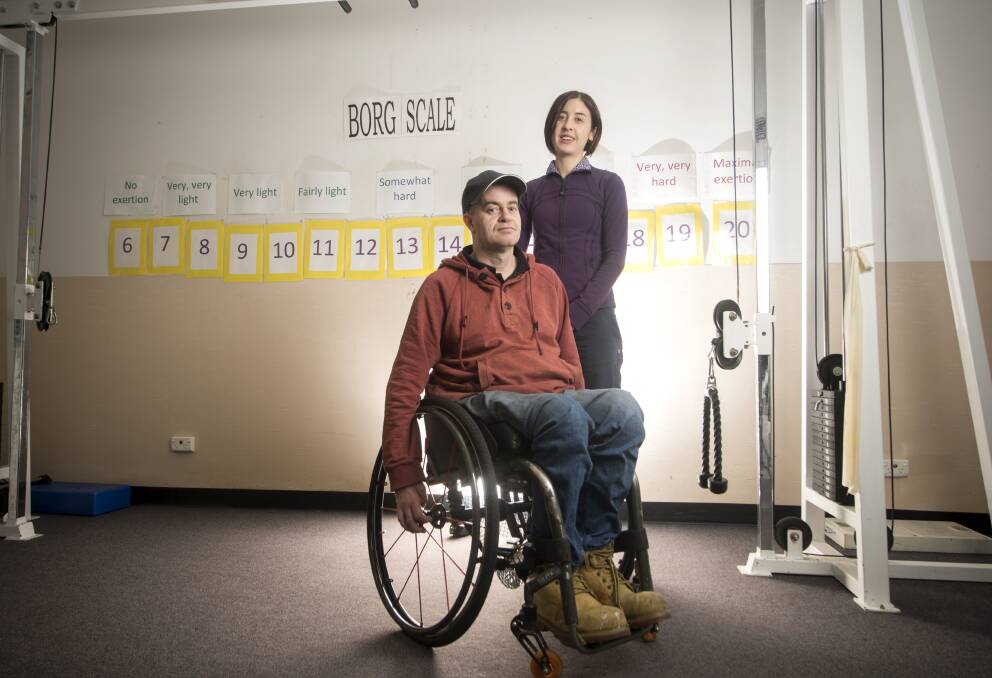 RECOVERY: Scott Mackay, who suffered a spinal cord injury in a car crash 20 years ago, and Bendigo Health physiotherapist Jo Spehr. Picture: DARREN HOWE