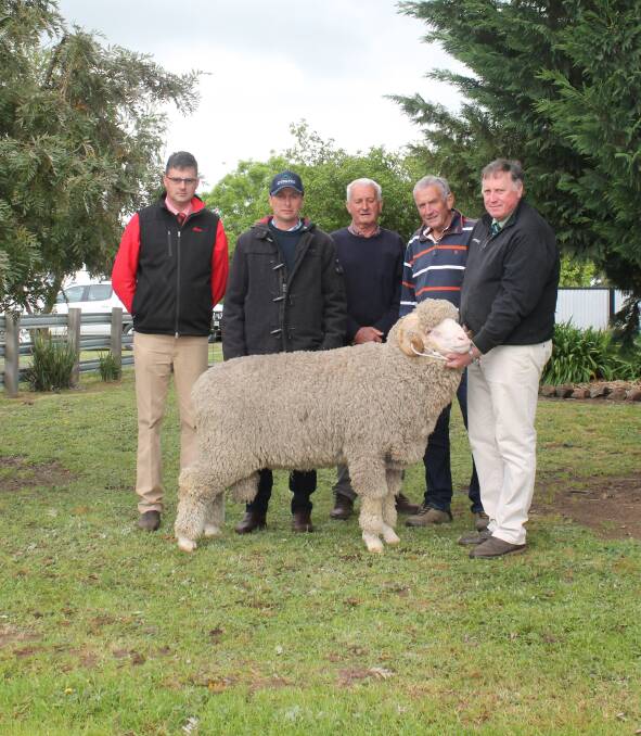  Elders Roly Coutts, Glenpaen's Rod Miller, Campbell and Greg Penny, Gleneden Merinos, Douglas with their purchase, held by Landmarks Stephen Chalmers.