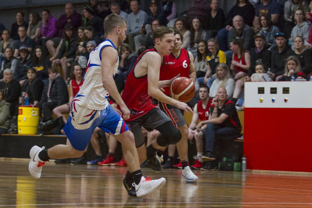 INFLUENTIAL: Redbacks young gun Zac Dunmore drives his way to the basket in Saturday night's 21-point win over Terang. Picture: Peter Pickering. 