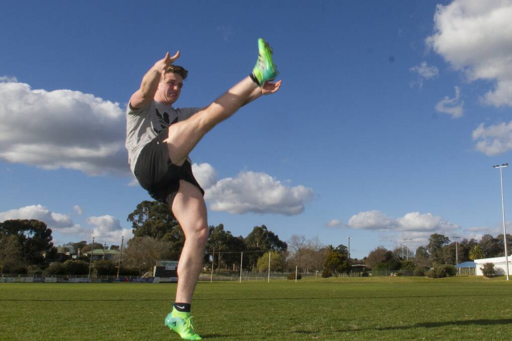 TECHNIQUE: Stawell's Zach Salmi practices his punting form ahead of his move to Missouri in America, where he will play for Central Methodist University. Picture: PETER PICKERING