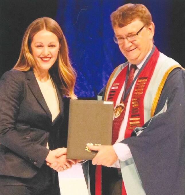 CONGRATULATIONS: Dr Alison Taylor with Professor Malcolm Hopwood, the president of the Royal Australian and New Zealand College of Psychiatrists.