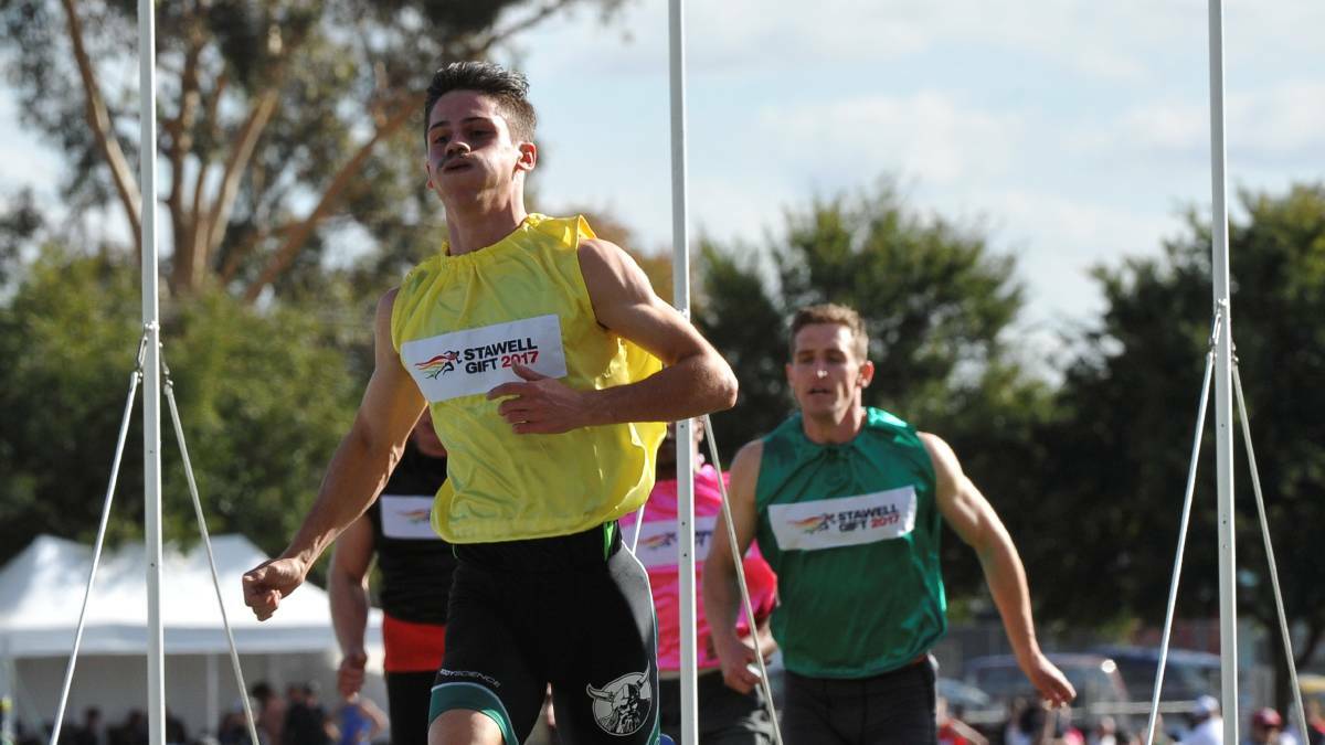 Langwarrin teenager Matthew Rizzo crosses the line to win the 2017 Stawell Gift.