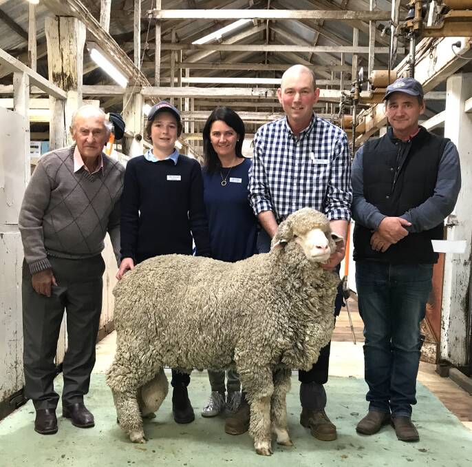 PLEASING: Pictured with the top-priced ram sold during the Melrose Merino Stud sale are Mr Anderson with Alex, Emma and Warren Russell and Ron Anderson. Picture: CONTRIBUTED