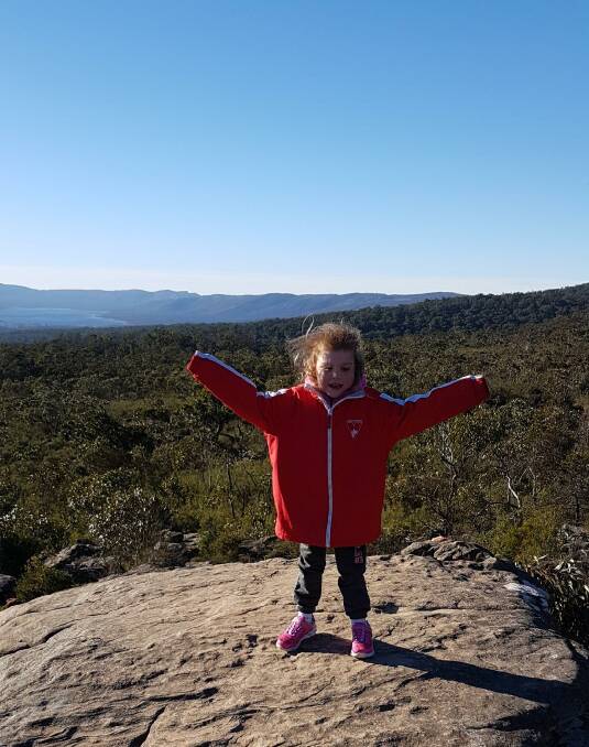 HAPPY: Matilda Rowden, pictured at a peak of the Grampians National Park, was diagnosed with a form of Acute Lymphoblastic Leukemia two years ago - and on Monday, she turned a corner. Picture: CONTRIBUTED