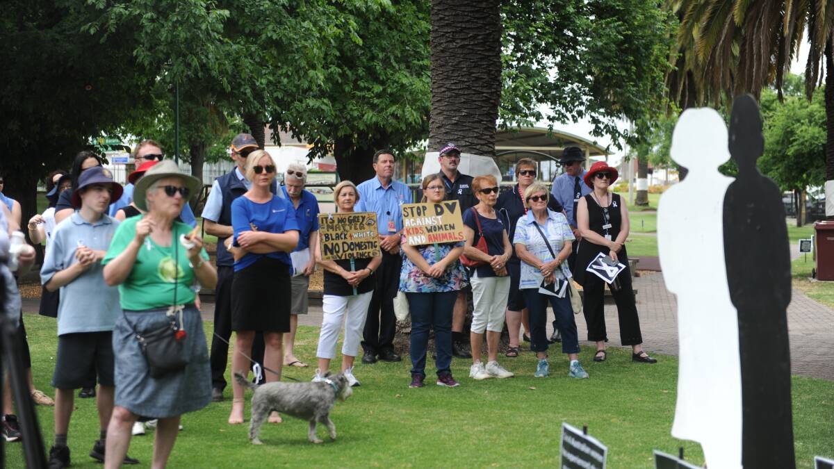 TAKING A STAND: People gather in May Park, Horsham on Friday after a walk to raise awareness of men's violence against women. Picture: DAINA OLIVER