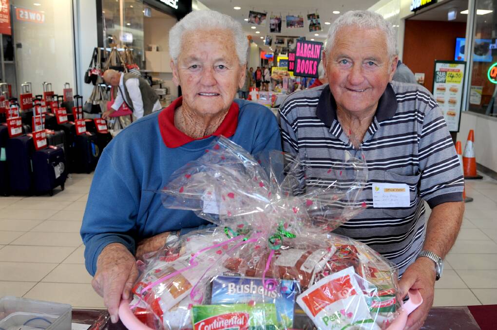 CELEBRATION: Siblings Joan and Doug Penny are selling raffle tickets for Horsham West Bowling Club's Mother's Day raffle - one of four raffles throughout the year.
