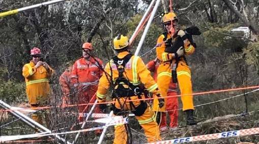 Emergency services work to rescue a dog that fell down a mine shaft earlier this month. 