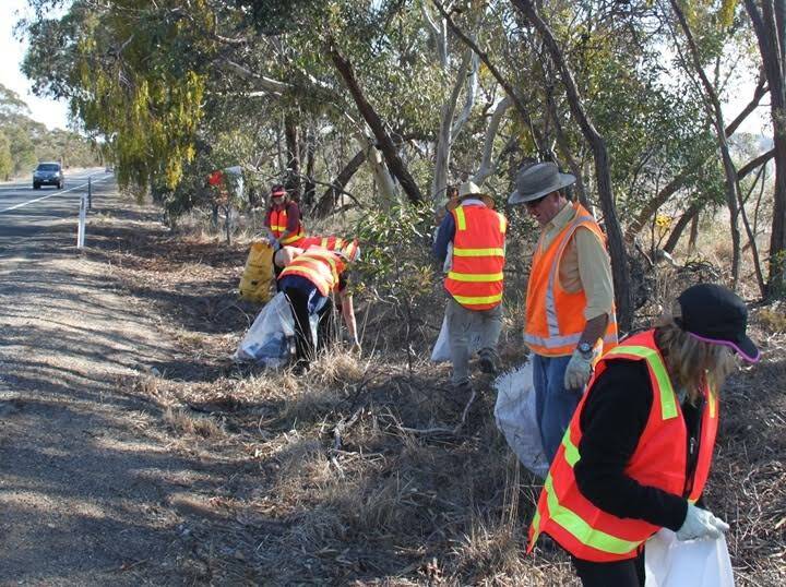 ACKNOWLEDGED: Stawell Urban Landcare members cleaning up waste left on the side of the Western Highway. 