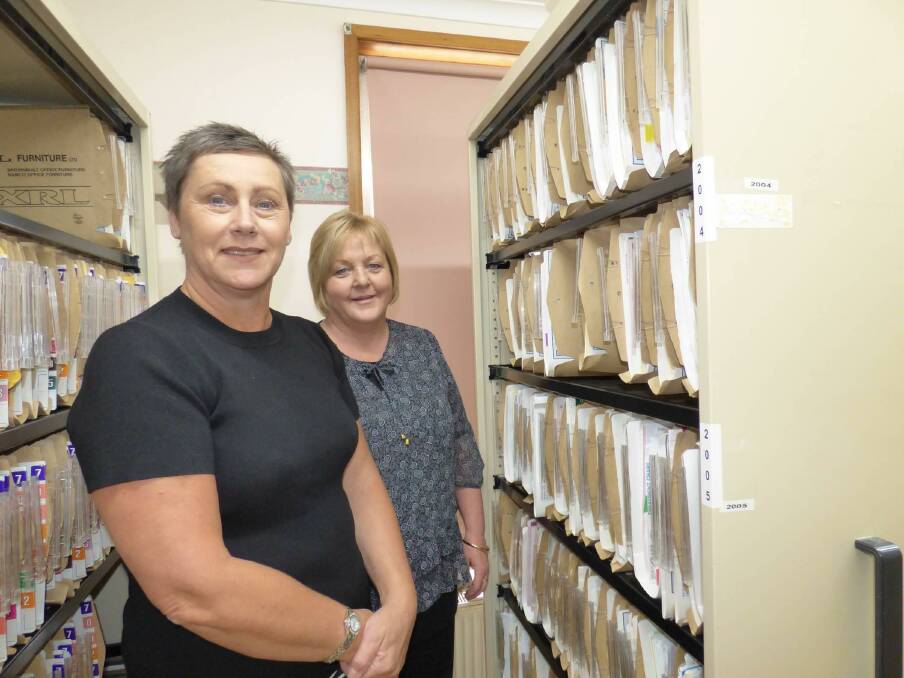 UPGRADED: Crowe Horwath partner Lynn Jensz with Eventide Homes chief executive officer Sue Blakey in front of the new filing system. 
