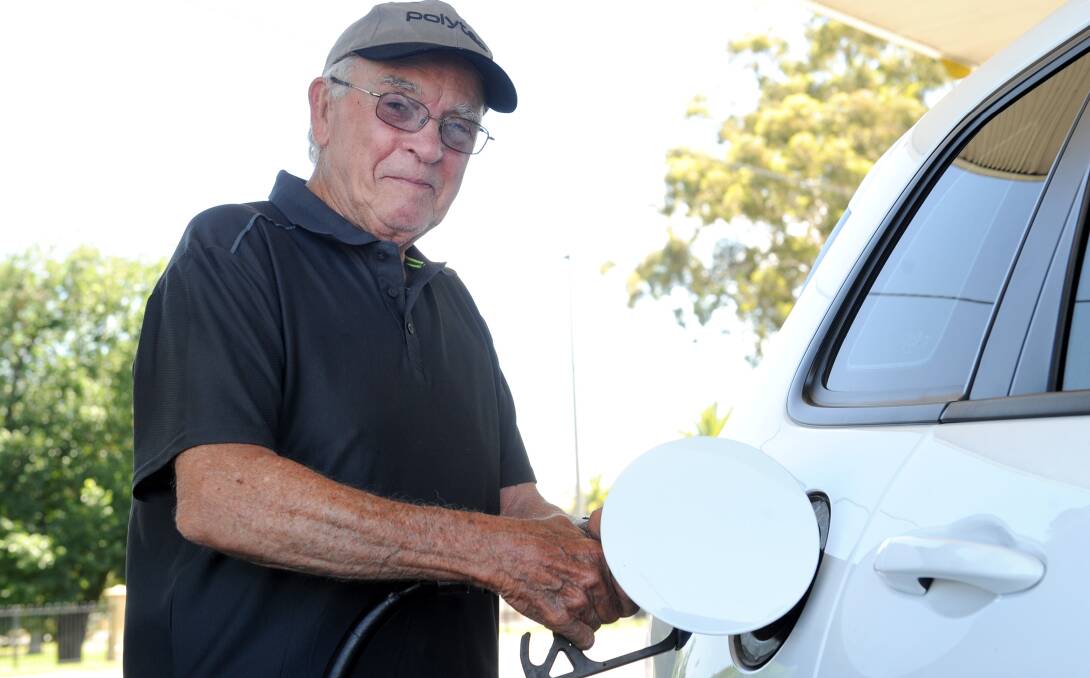 Gordon Johnson from Ballan fills up in Horsham, which had reasonable petrol prices this week. Picture: OLIVIA PAGE