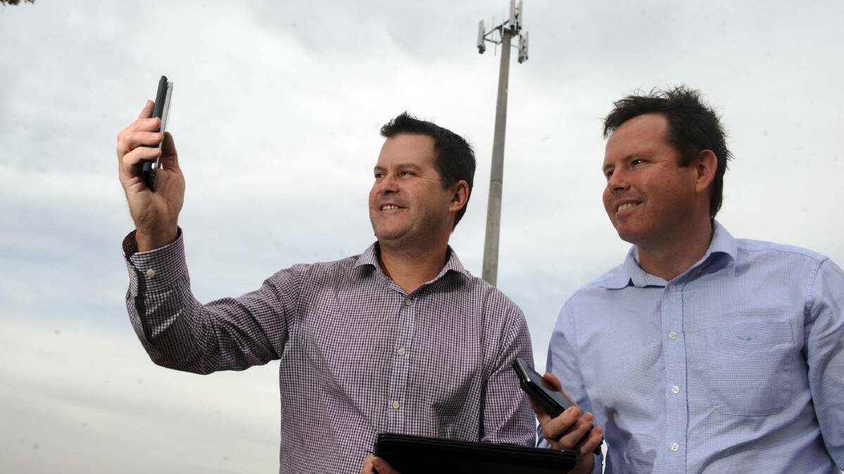 Telstra area general manager Steve Tinker and Member for Mallee Andrew Broad launch a new Wimmera mobile phone tower as part of the black spot program.