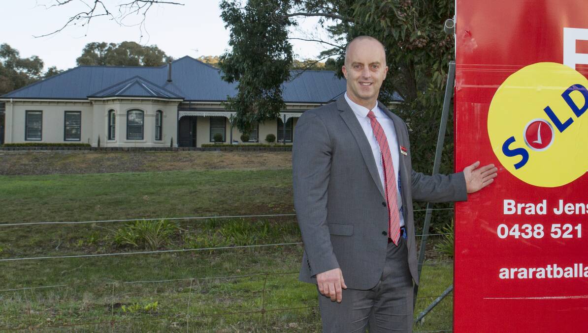 SOLD: Ararat Ballarat Real Estate sales manager Brad Jensen with the Picnic Road house that sold within the range of $875,000 to $950,000 within 22 days of listing. Picture: PETER PICKERING