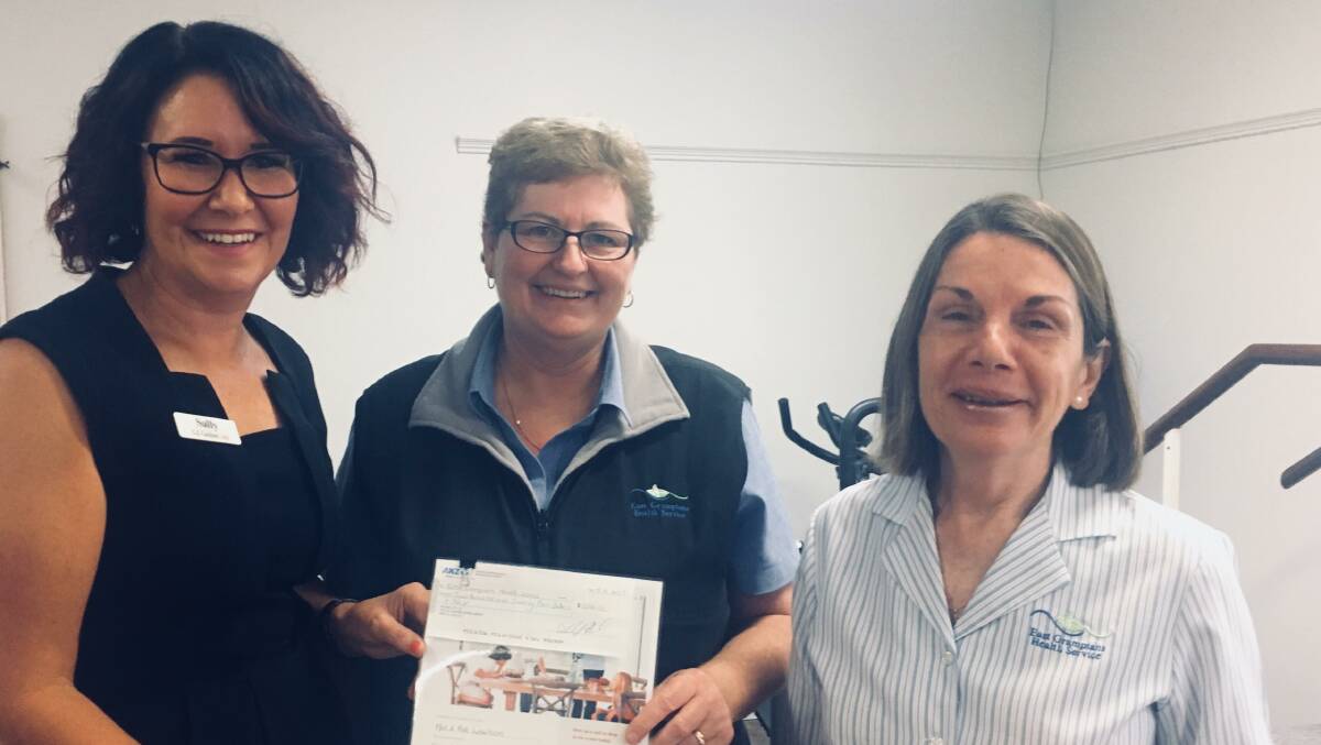 HELPING HAND: Sally Heard of G. J. Gardner Homes Ararat presents a cheque to East Grampians Health Service’s Caroline Hamilton and Cheryl Haines.