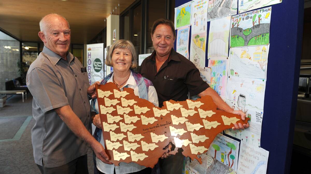 Don Johns, Heather Phillips and Robin Barber prepare for the 2015 Tidy Towns Australia awards.