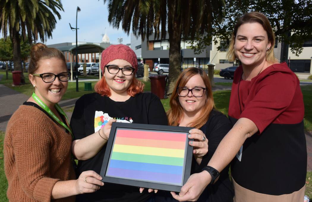 Headspace youth counsellor Brooke MacInnes, Wimmera Pride Project co-founder Maddi Ostapiw, Wimmera UnitingCare family support worker Belinda Sue Parsons and Wimmera Health Care Group community diversity committe chair Amelia Crafter prepare for an LGBTI celebration on May 17. Picture: REX MARTINICH 