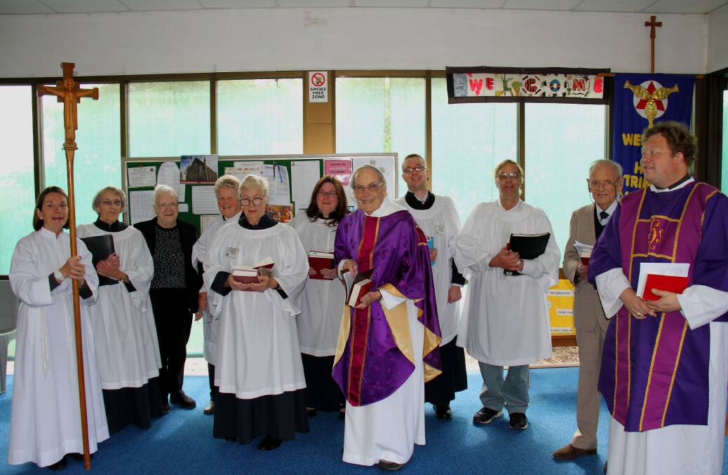 60 YEARS: Reverend Tom Banfield with Holy Trinity Ararat Advent Sunday choir members. Picture: CONTRIBUTED