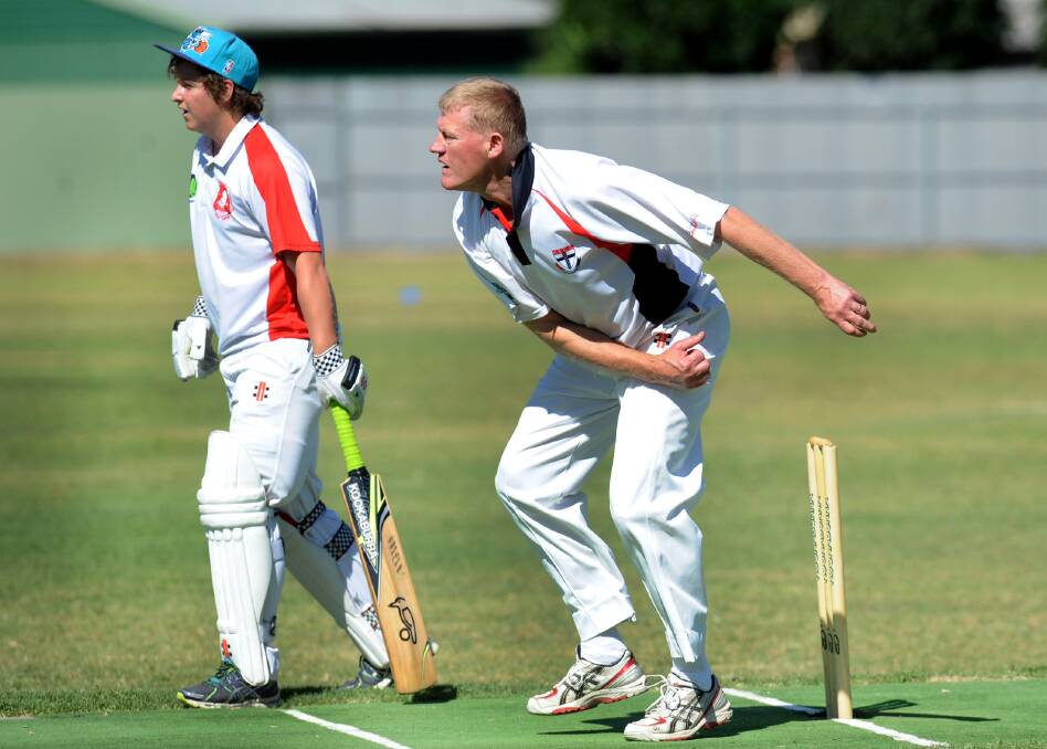 Carroll bowling for his beloved Horsham Saints in 2015.