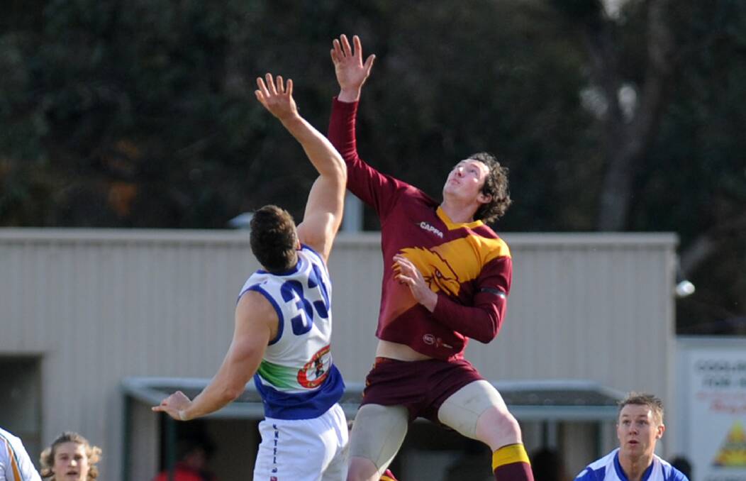 LEAP: Nathan Naylor jumps for the ball for Border Districts. Border Districts suffered a loss against Lucindale. Picture: SAMANTHA CAMARRI 