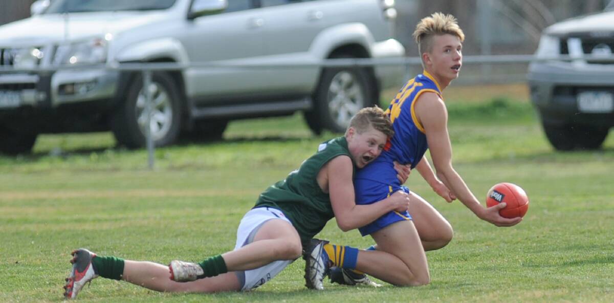 TACKLE: Jakob Cocks playing for Wimmera Mallee in the McDonalds Cup earlier in 2016. Picture: SAMANTHA CAMARRI