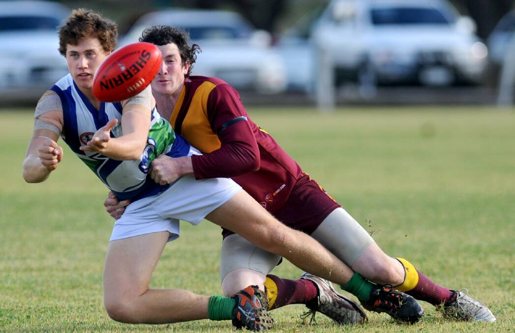 TACKLE: Kaniva-Leeor United player and Border Districts' Lachlan Seed tackle for the ball in the Kowree Naracoorte Tatiara Football League. Picture: SAMANTHA CAMARRI 