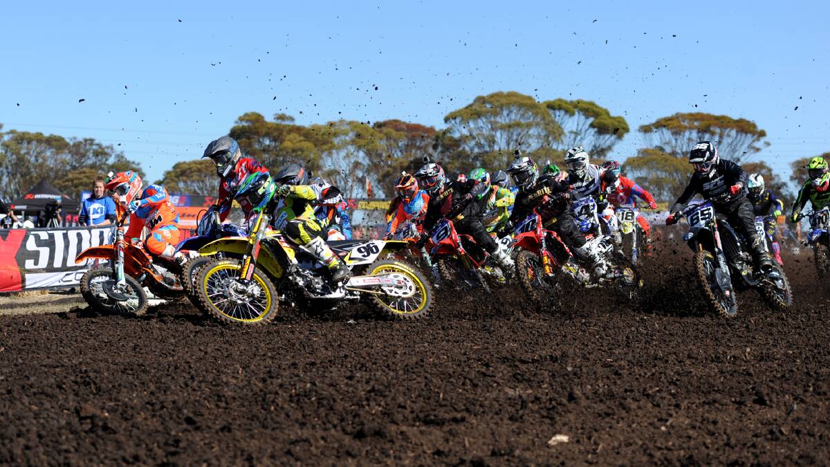 AROUND THE BEND: Competitors in the MX1 open class come around a corner at the Horsham Motorcycle Club in 2015. Picture: SAMANTHA CAMARRI 