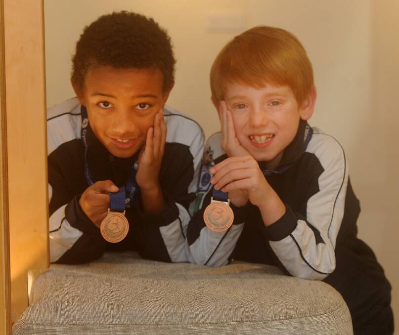 BRONZE: Remi Bailey and Orlan Hart won medals at the state gymnastics championships. The Natimuk boys team finished fourth overall. Picture: SAMANTHA CAMARRI