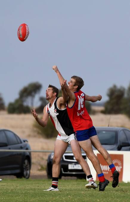 PUNCH: Kalkee's Hugo Papst punches the ball against the Saints earlier in the season. Picture: SAMANTHA CAMARRI