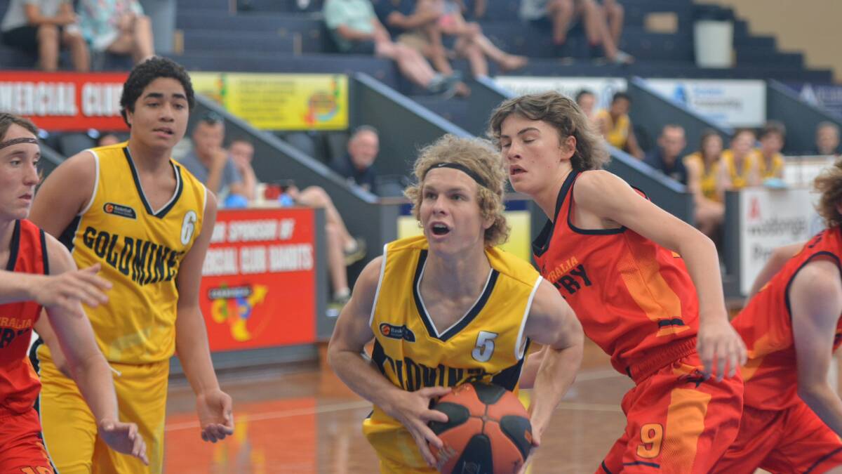 ON THE ATTACK: Ben Hobbs drives to the basket against the SA Sharks on Tuesday.