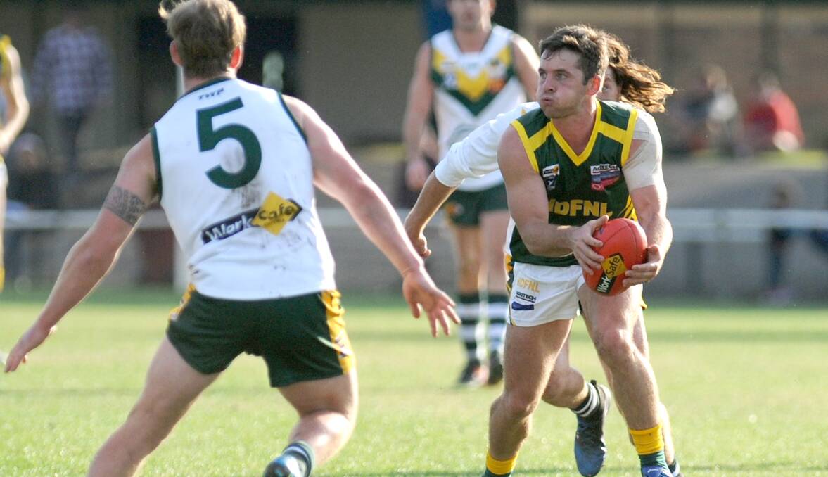 UP NORTH: Robbie Miller playing in an interleague game for Horsham District. He has been enjoying his football in the Northern Territory this summer. 