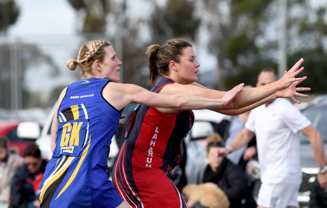 Natimuk United's Casey Vanstan and Laharum's Caitlin Story battle it out on Saturday. Picture: SAMANTHA CAMARRI