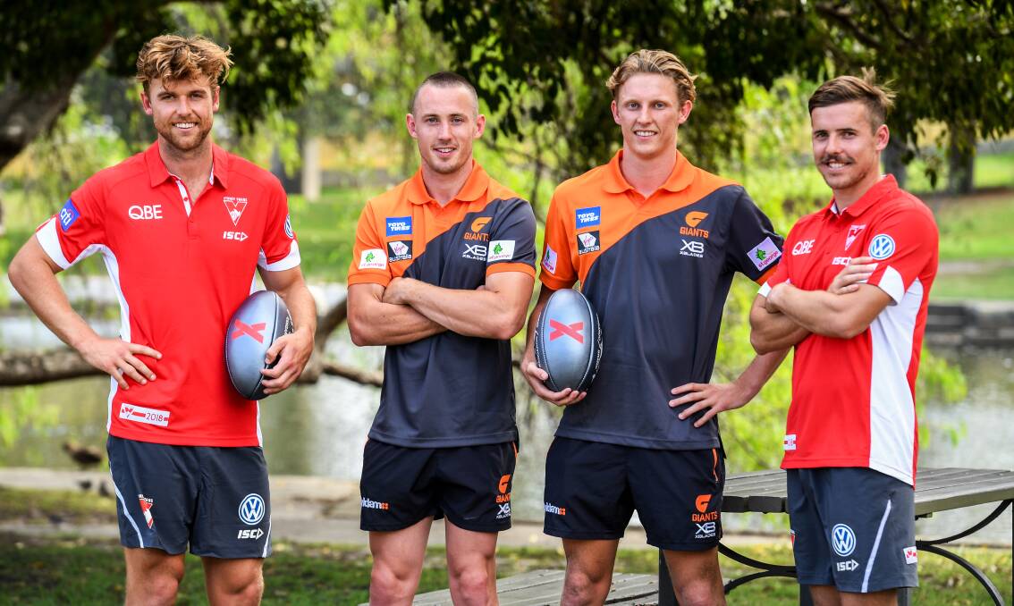 NEW LOOK: Greater Western Sydney Giants and Sydney Swans AFL players Dane Rampe, Tom Scully, Lachie Whitfield and former Horsham Demon Jake Lloyd at the announcement of the 2018 AFLX tournament at Allianz Stadium in Sydney. Picture: AAP