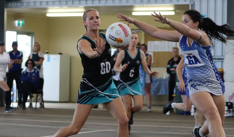Swifts player Julz Coates passes the ball against Harrow-Balmoral back in round five. Picture: TRISH RALPH