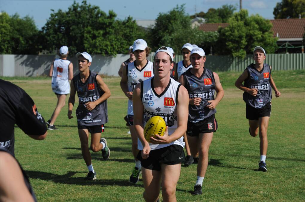 TESTING: Wimmera footballers hoping to make the Rebels final squad seen training in Horsham in November. Picture: STUART McGUCKIN