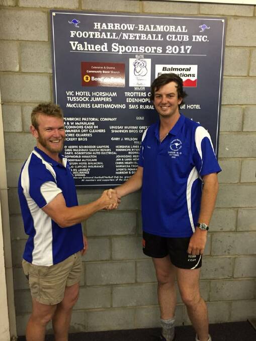ON BOARD: Roos coach Nick Pekin welcomes new signing Todd Lawrence to the club. Picture: CONTRIBUTED