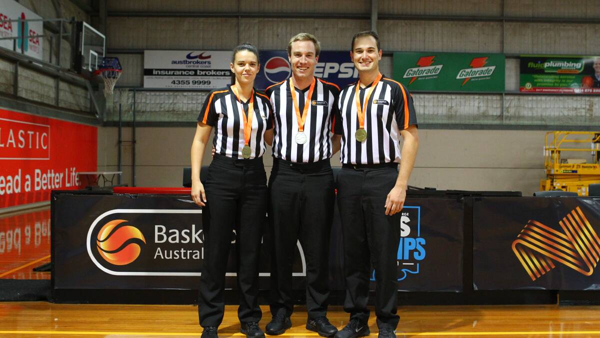 NEXT LEVEL: Women's gold medal match referees Jacqui Dover, Matthew McLoughlin and Josh Knight. Picture: KANGAROO PHOTOS