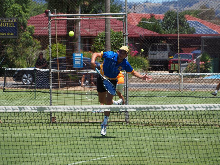 SERVE: Ben Brooksby fires a serve competing in the under-25s men's singles.