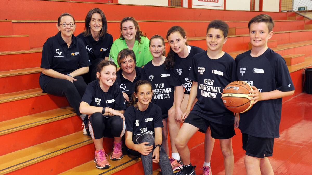 COACH: Nicole Lakin with junior Horsham basketballers after qualifying for the basketball jambouree in 2016.