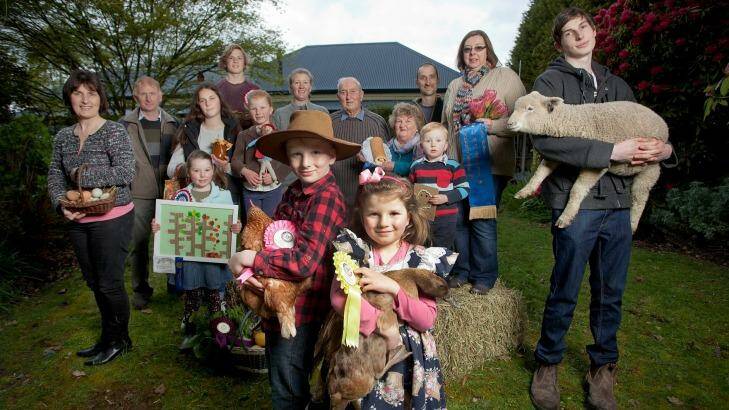 The Whittlesea show is an annual ritual for the extended Hawke family. Pictured are Hunter and Alice Hawke (front), and (from left)  Adele Heaney, Roylen Hawke, Stefanie Hawke, Ebony and Lachlan Heaney, Evelyn, Erica, Rodger, Bev, Lyndon, Oliver and Heather Hawke and Daniel Heaney. Photo: Arsineh Houspian