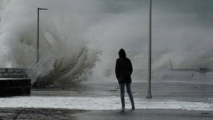 Large waves hit the Mornington pier on Tuesday. Photo: Joe Armao