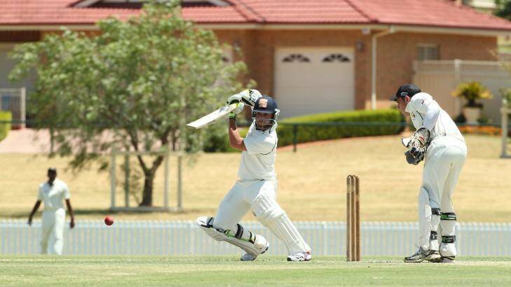 Best of the West: Phillip Hughes on his way to another century for Western Suburbs against Blacktown in 2011. Photo: Anthony Johnson 