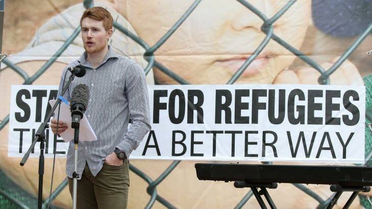 Former Save the Children worker Tobias Gunn speaks about life for detainees on Nauru at a protest last week. Photo: Jeffrey Chan