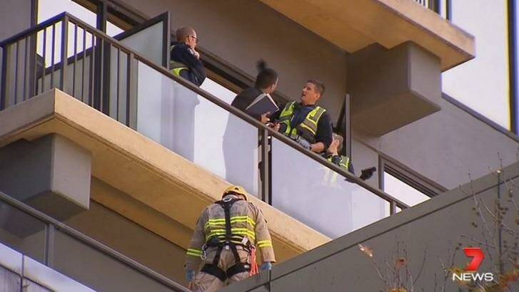 The woman fell from an apartment balcony on Queen Street just after 4pm. Photo: Channel Seven