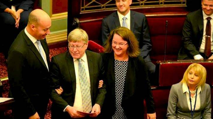 Bruce Atkinson is escorted to the chair of the upper house on the first day of the new parliament by MP Mary Wooldridge.   Photo: Penny Stephens