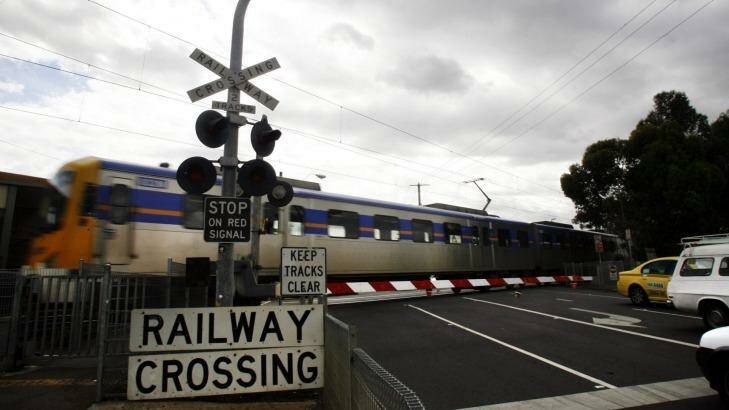 Labor has announced the first 17 of 50 level crossings to be removed in the next eight years. Photo: Paul Rovere