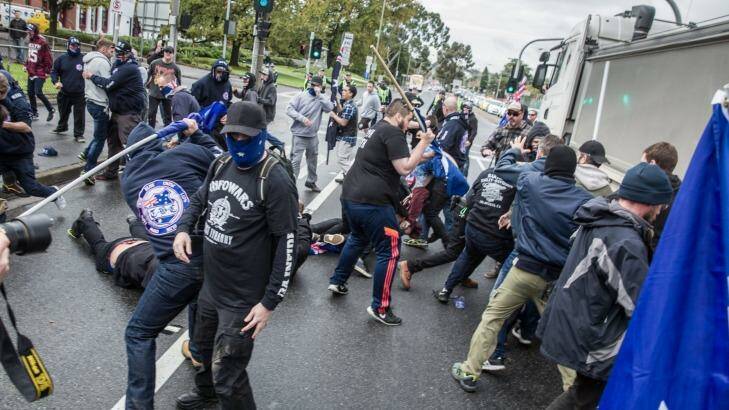 Protesters from rival anti-racism and anti-Muslim groups clash in Coburg on Saturday. Photo: Mathew Lynn